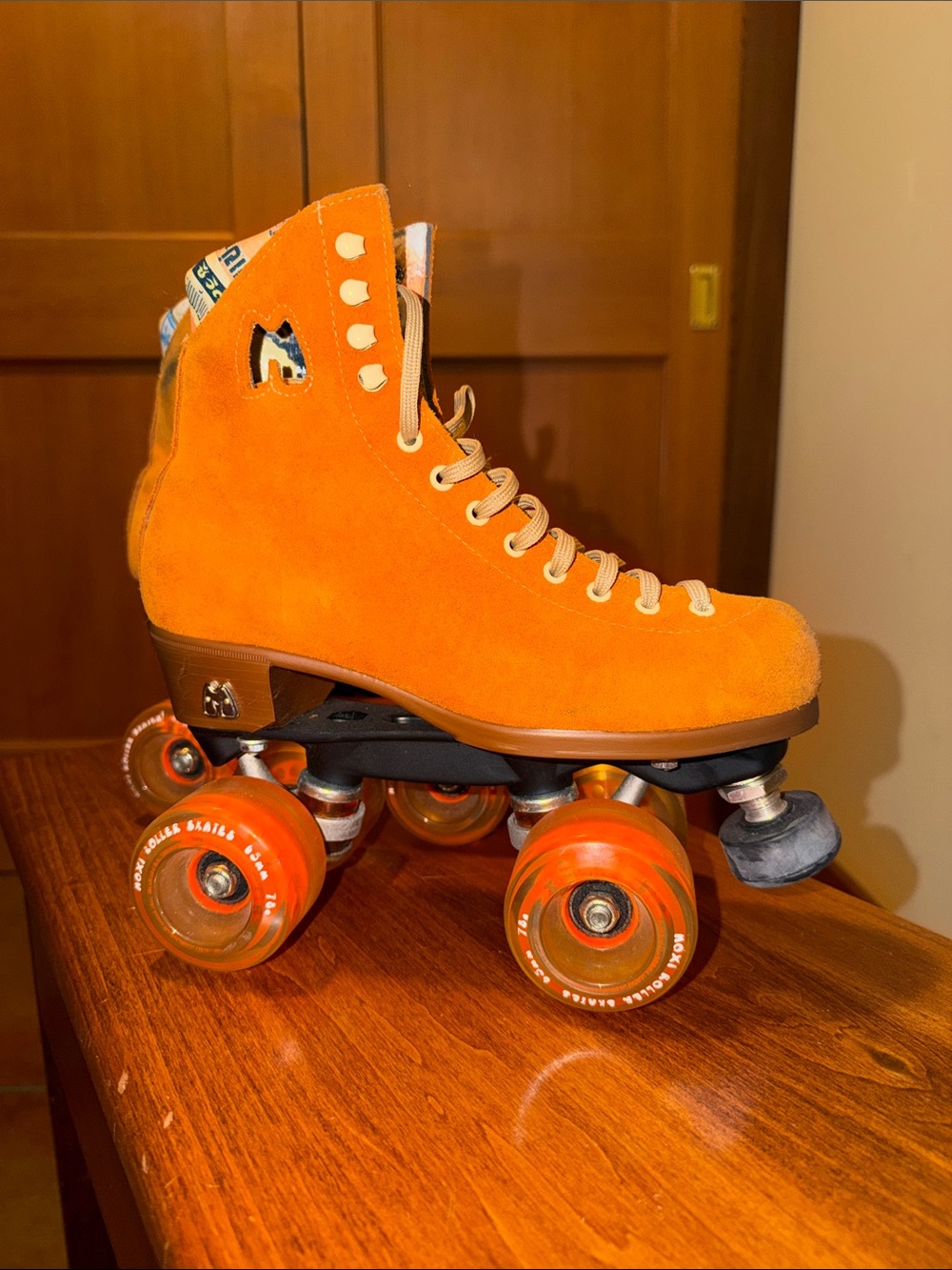 Moxie Orange Suede Quad Roller Skate